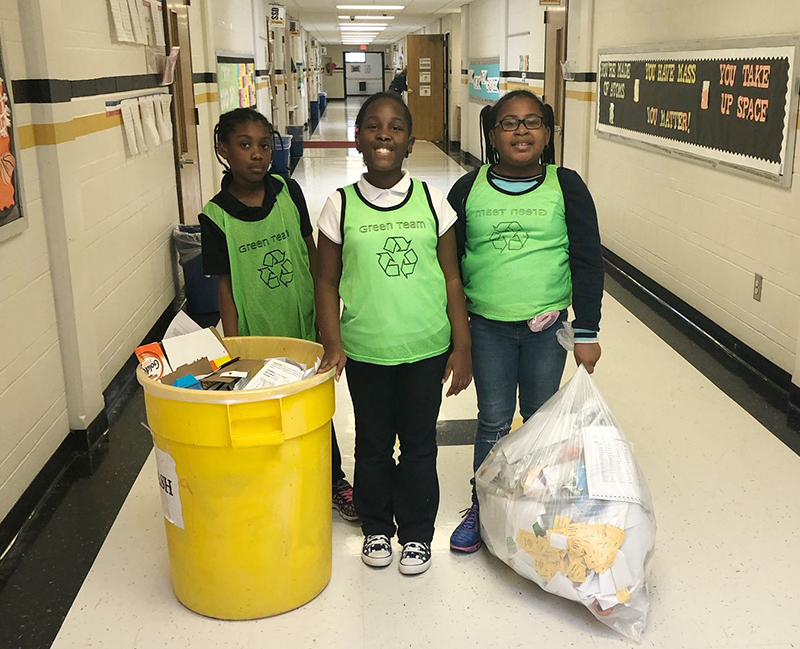 Students collecting recyclables